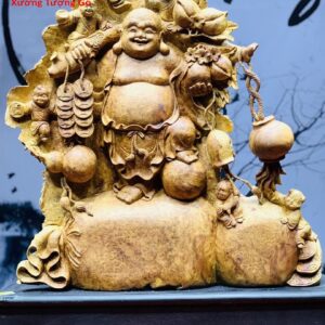 Di Lặc ngũ tiểu vác đào nu hương.