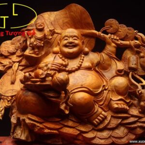 Di Lặc tam tiểu vác lá gỗ hương.