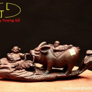 Nhị tiểu dắt heo gỗ trắc