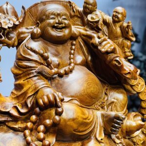 Di lặc vác đào ngồi bao nu hương.