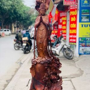 Quan Âm ngự cá chép hóa rồng gỗ cẩm.