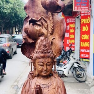 Quan Âm ngự cá chép hóa rồng gỗ cẩm.