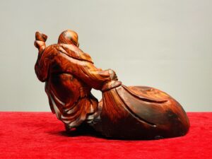 Di Lạc Kéo Bao Tiền Gỗ Trắc