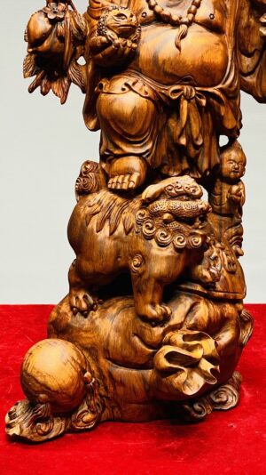 Di Lạc Vác Cành Đào Nhất Tiểu Đứng Bao Tiền Gỗ Sưa